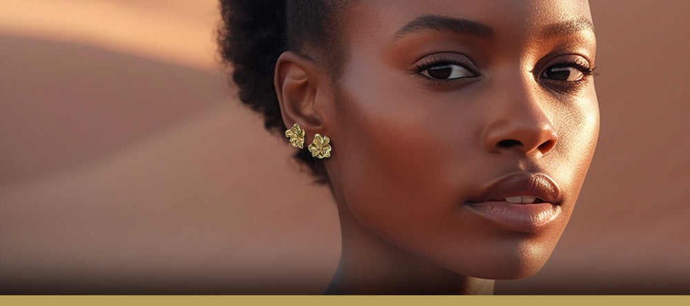 Blomster ørering guld - Smykkedesign af organiske blade, her vist med to på samme øre - Livva