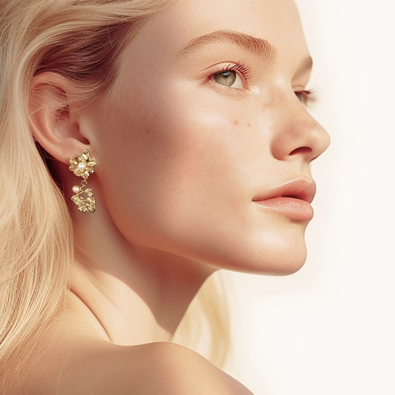 Floral drop earrings gold - with a white- and a pink pearl shown on model – Alva Florali collection