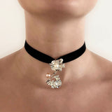 Flower pendant in velour ribbon – A statement necklace in sterling silver with 2 pearls on model – Alva Florali collection