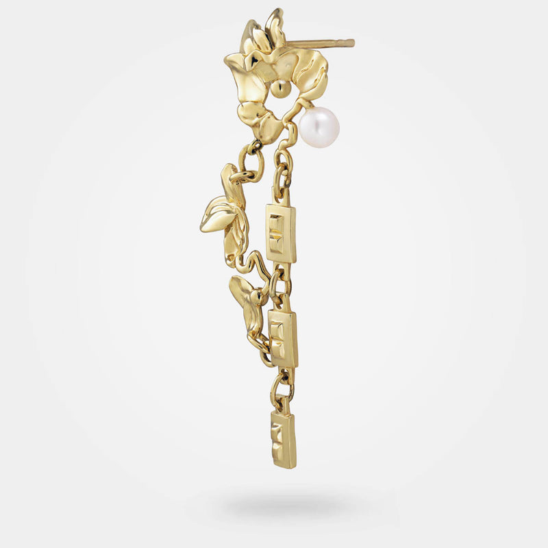 Gold floral earrings - Organic jewellery design in gold, with surreal leaves, chains, and a white pearl – side view - Livva