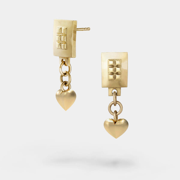 Heart drop earrings gold – A square design with tiny studs and a dangling heart – Livva Østerby.