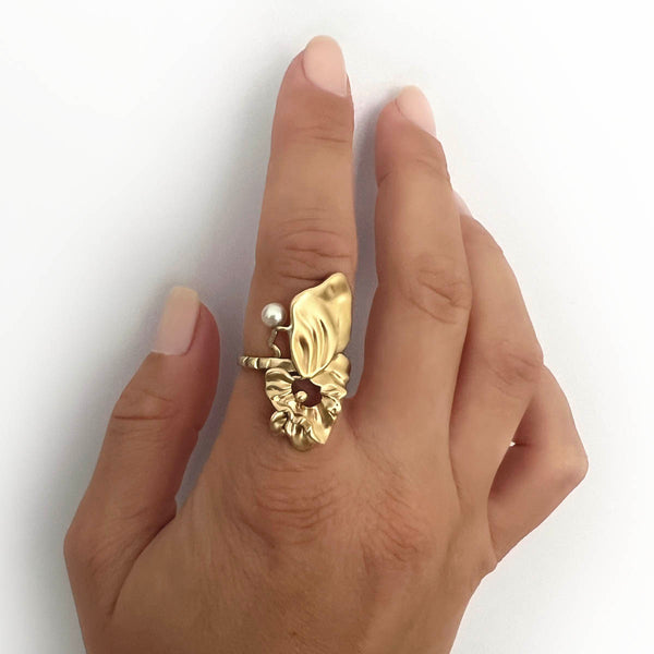 Organic gold ring - Organic jewellery with surreal floral leaves, a floating white pearl, and rivets - on hand - Livva