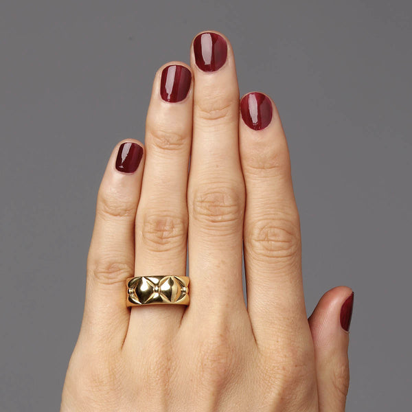 Gold ring jewellery on hand - A quilted simple ring - Straight design meets lush organic top - Sofia Chester collection.
