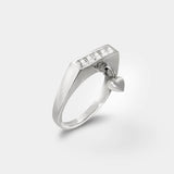 Ring with heart charm – Sleek square design in sterling silver with tiny studs and a heart dangle charm – Livva Østerby.
