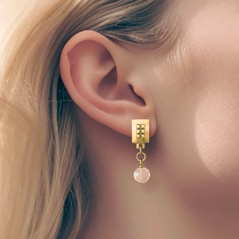Earrings square – Square gold design with tiny studs & elegant clear quartz gemstone dangle on model – Livva Østerby.