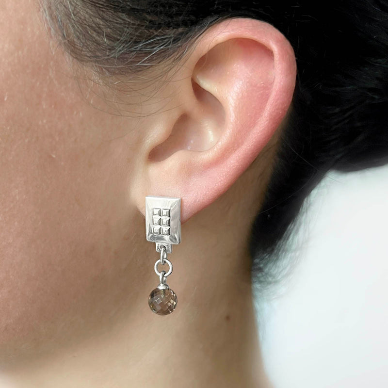 Earrings square silver – Square design with tiny studs & elegant smoky quartz gemstone dangle on model – Livva Østerby.