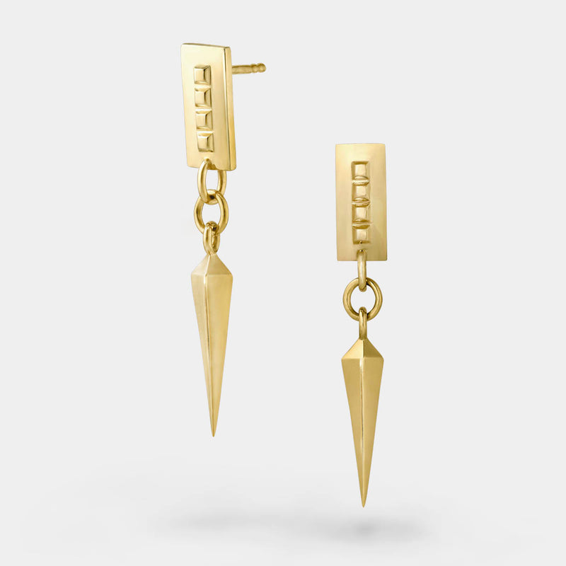 Spike earrings gold – A sleek square design with tiny studs and a dangling spike – Livva Østerby.