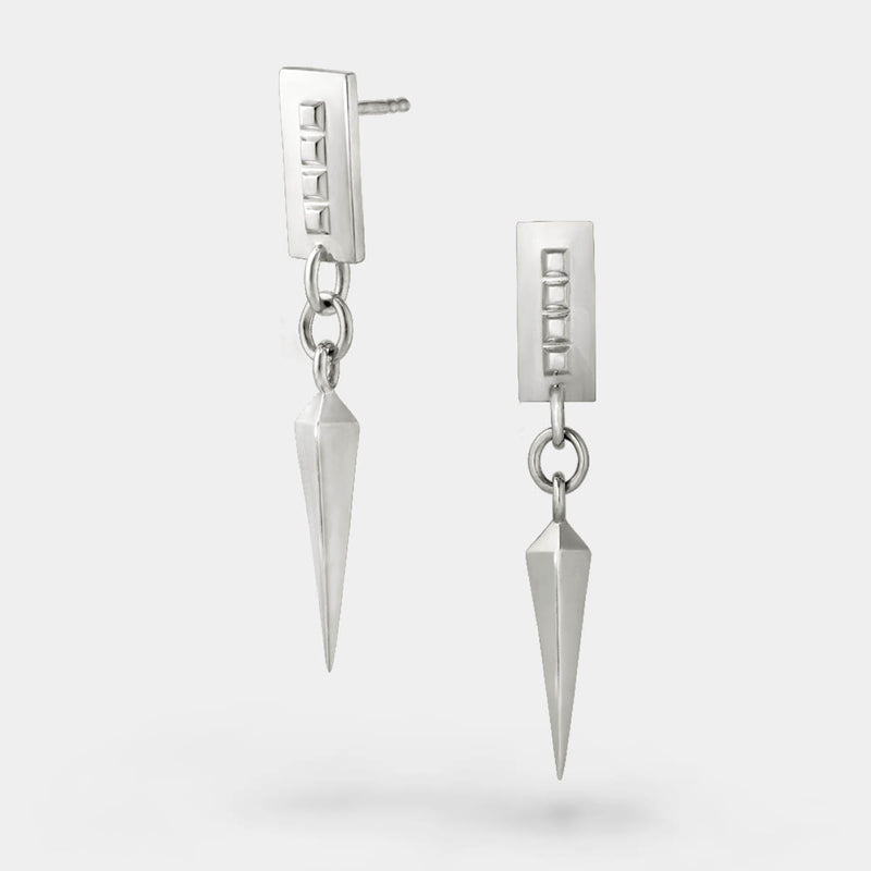Spike earrings silver – A sleek square design with tiny studs and a dangling spike in sterling silver – Livva Østerby.