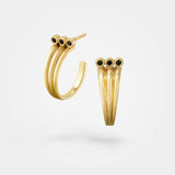 Triple hoop earrings gold – Cool 18k design with black diamonds - 3 simple hoops merging into one – Skylar Sway collection.