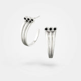 Triple-hoop earrings – 3 simple hoops merging into one - Cool sterling silver with black diamonds - Skylar Sway collection.