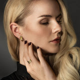 Triple hoop earrings in 18k gold with 3 black diamonds and matching V-Ring – Skylar Sway collection on model.