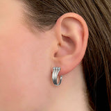 Triple hoops – Cool sterling silver earrings with white diamonds - 3 simple hoops in one – Skylar Sway collection on model.