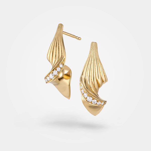 Twist diamond earrings - innovative classic luxury earrings - a modern sculptural twist in 18k gold - Grace York collection.