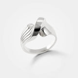 Twist ring – a curved sculptural ring in sterling silver - statement of cool innovative Danish luxury - Grace York collection