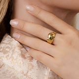 Twisted gold ring - innovative hybrid of a classic look updated in a sculptural twist - Grace York collection on model.