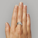 V-Ring - shaped like a V in sterling silver with 2 sides divided by 3 white diamonds shown on model – Skylar Sway collection.