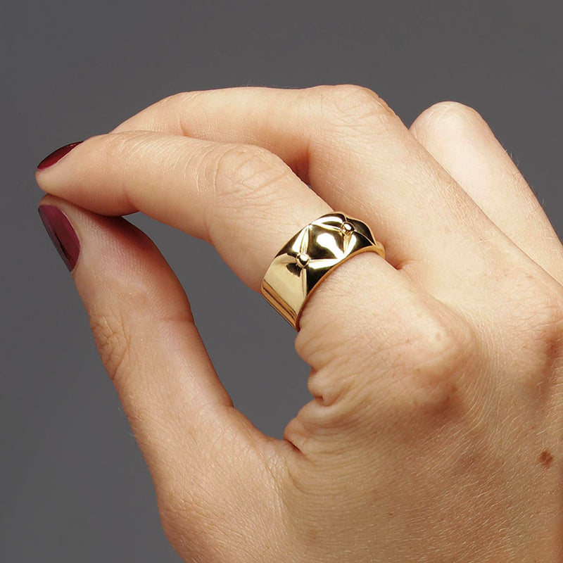 Wide Ring - Sculptural Danish Design in 18k gold where straight design meets quilted organic top, on pointing finger - Livva