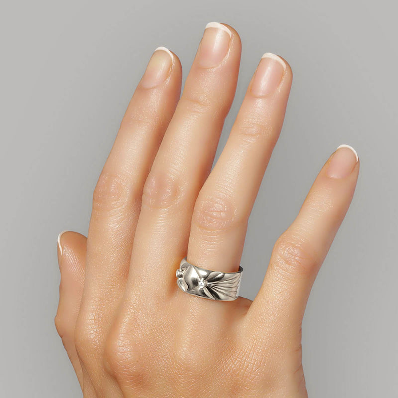 Wide sterling silver ring - A sculptural Danish design with quilted organic top in sterling silver and white diamonds, on hand - Livva